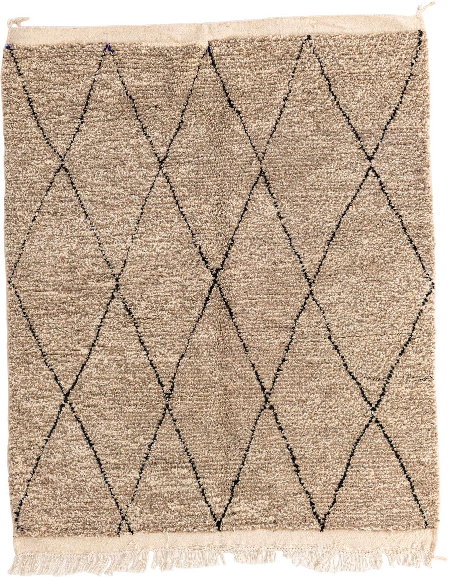 A 5x8 rectangular brown shag rug with a black tribal diamond pattern and fringed edges, ideal for a living room.