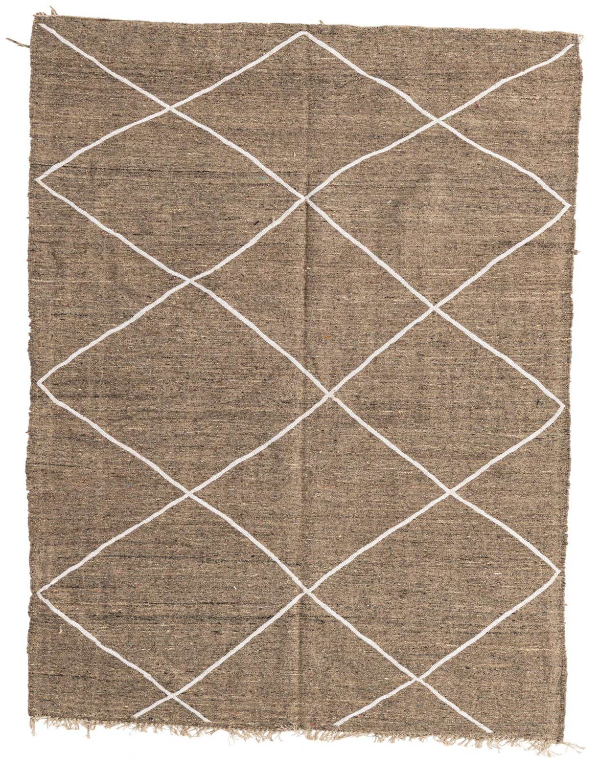 A 4x6 rectangular brown wool shag rug featuring a modern tribal diamond pattern in white, suitable for a living room.