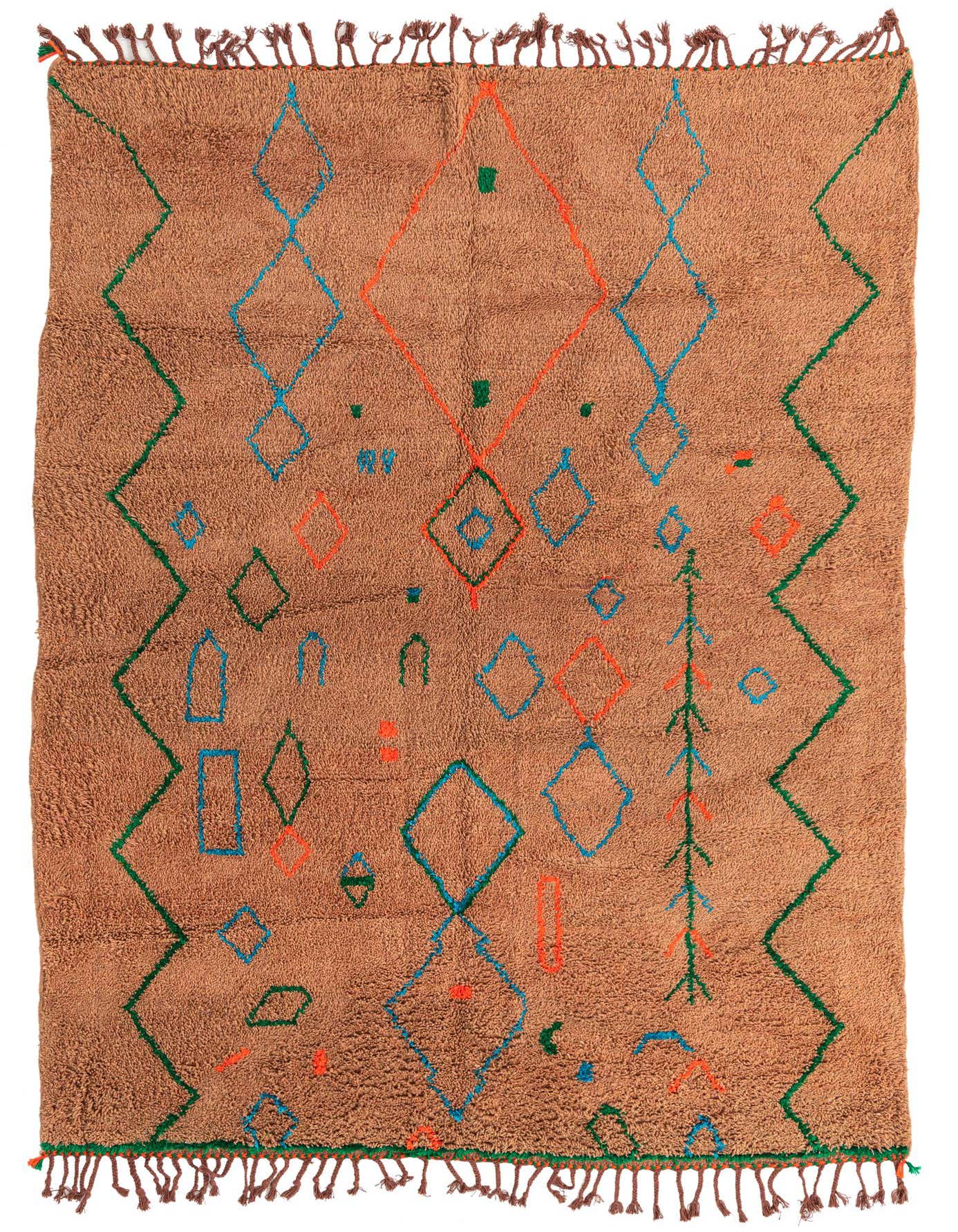 A 7x10 rectangular brown shag rug with a modern tribal pattern of blue, orange, and green geometric shapes and zigzags.