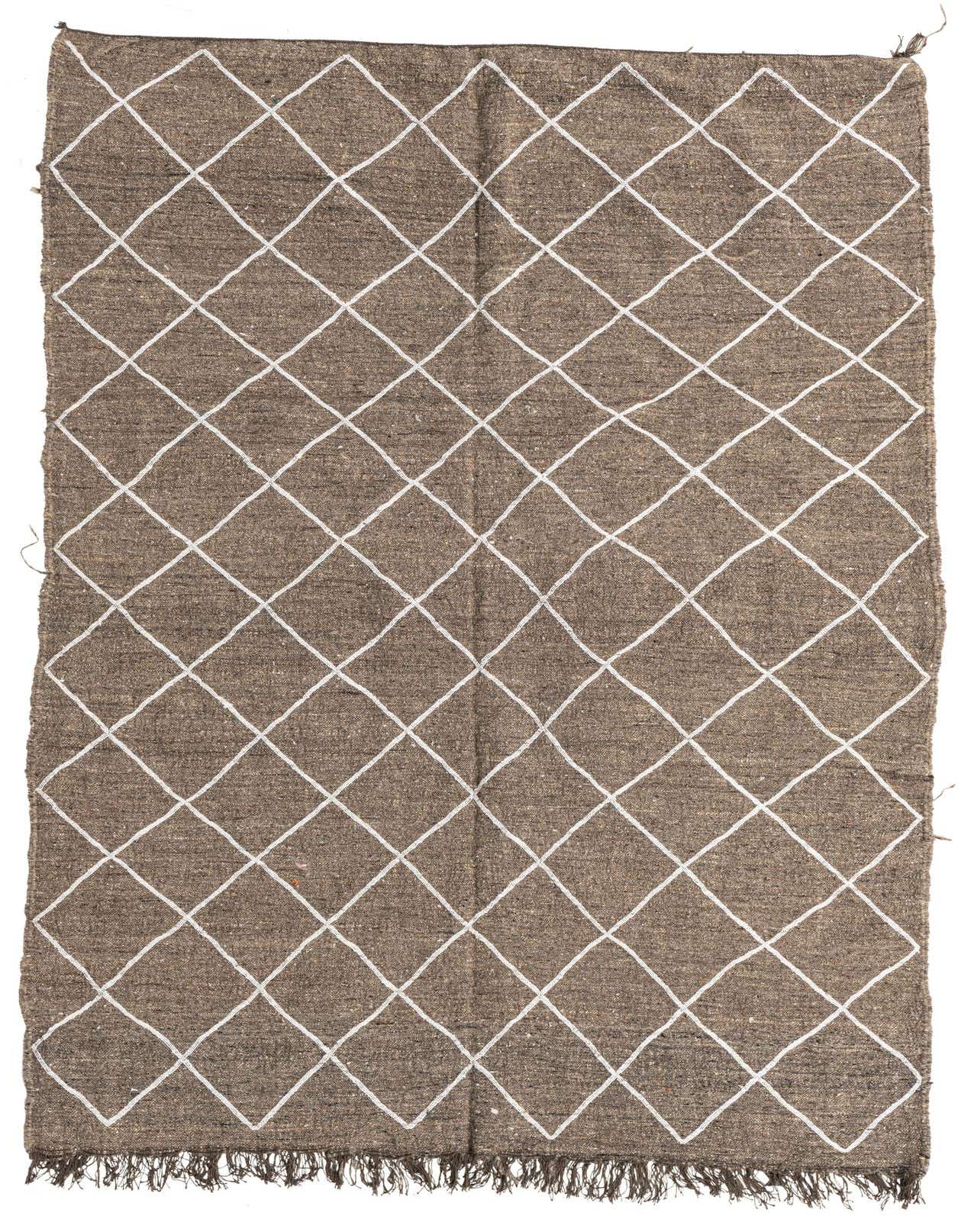 A 5x8 rectangular brown tribal shag rug with a white diamond pattern and fringe, suitable for a living room.