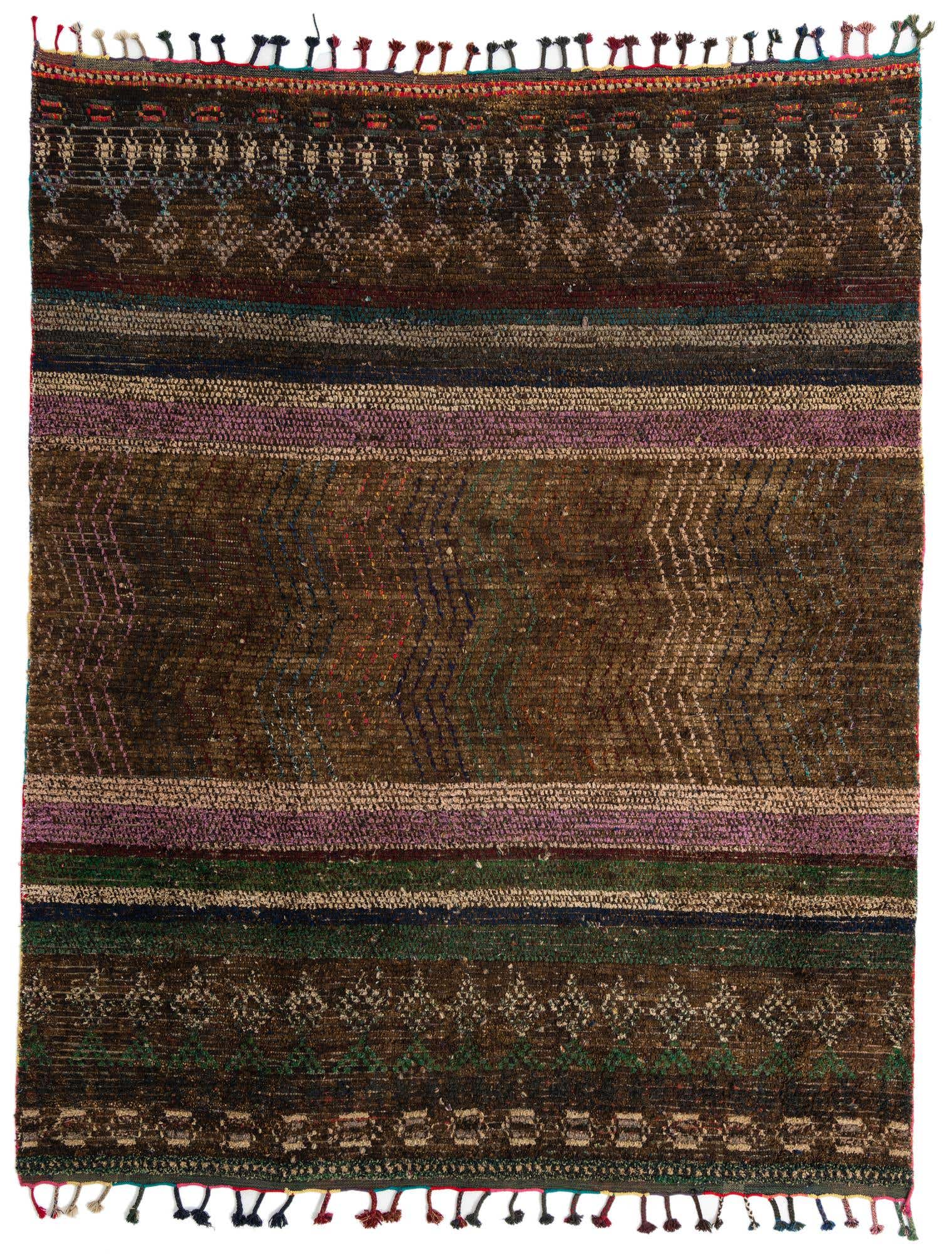 A rectangular 8x10 brown shag rug with tribal patterns in tan, purple, and green stripes, featuring colorful tassels.