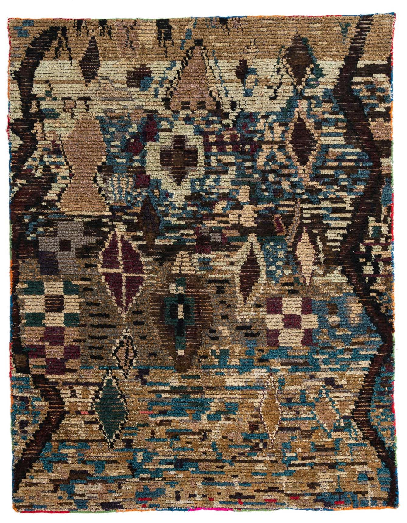 A 5x8 rectangular Moroccan shag rug with an abstract tribal pattern in browns, tans, and hints of blue and burgundy.