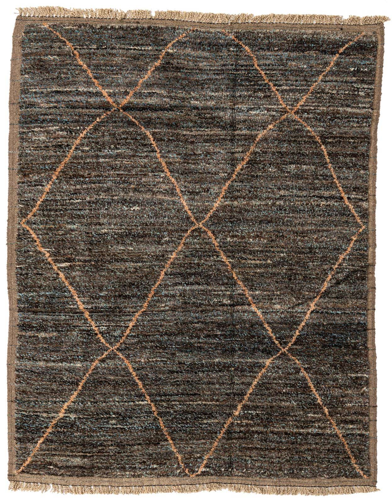 A 6x9 rectangular brown shag rug with a tribal diamond pattern in tan, suitable for a living room.
