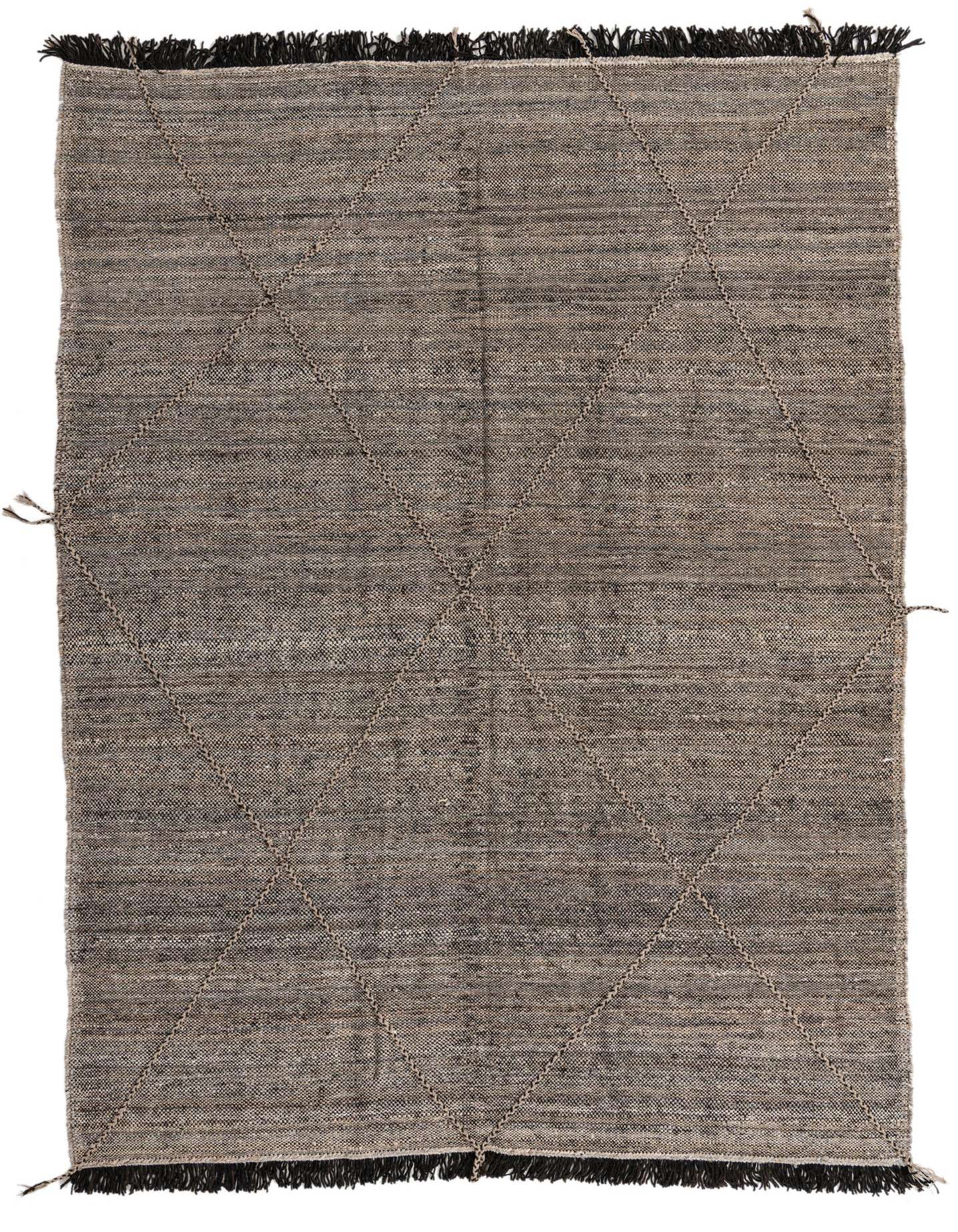 A 7x10 rectangular brown and tan tribal wool shag rug with a diamond pattern and black fringe.