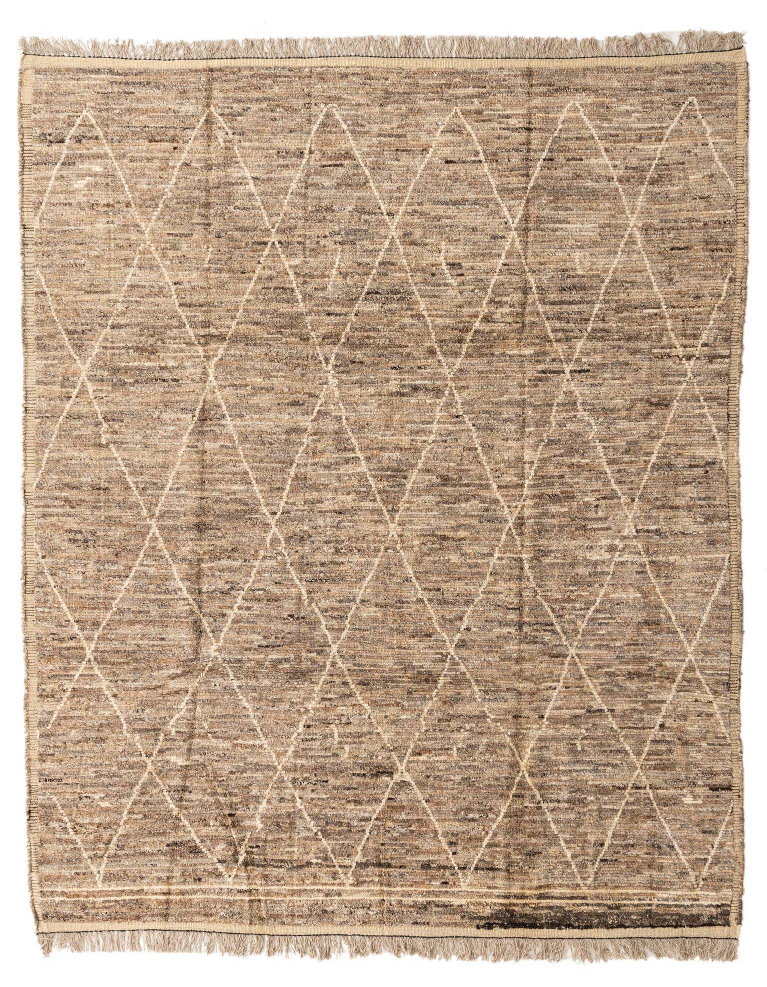 A rectangular 8x10 brown and tan wool shag rug with a modern tribal diamond pattern and fringed edges.