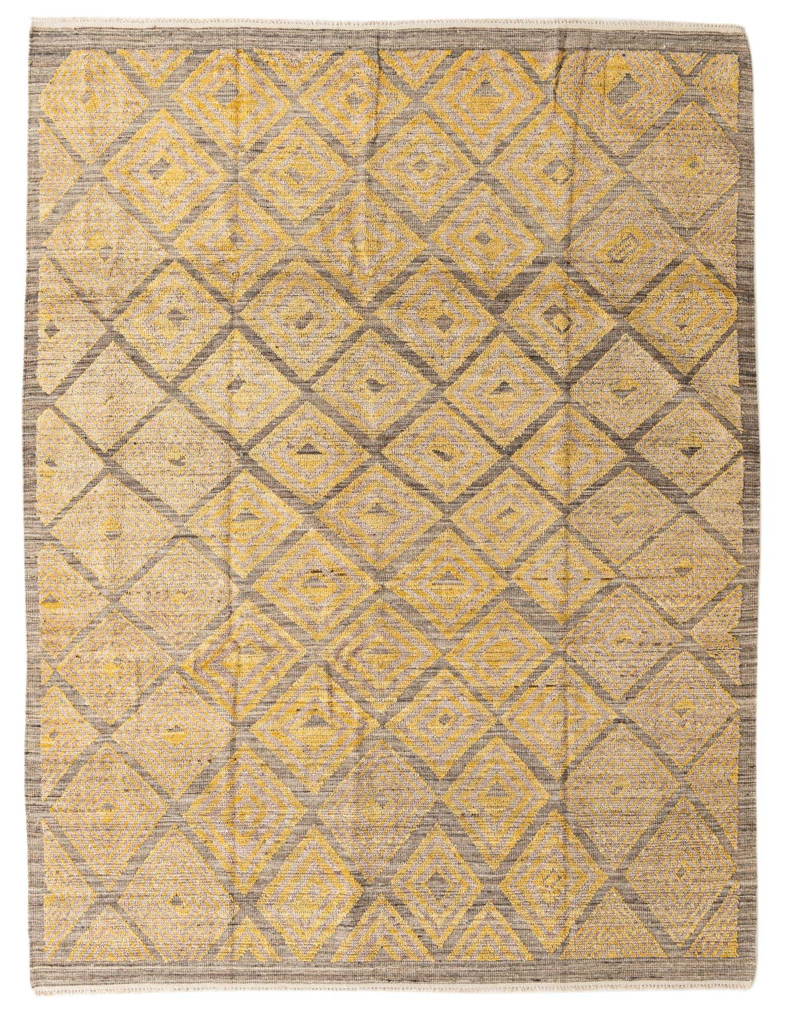 A rectangular 8x10 Moroccan shag rug with a tribal diamond pattern in shades of brown and tan.