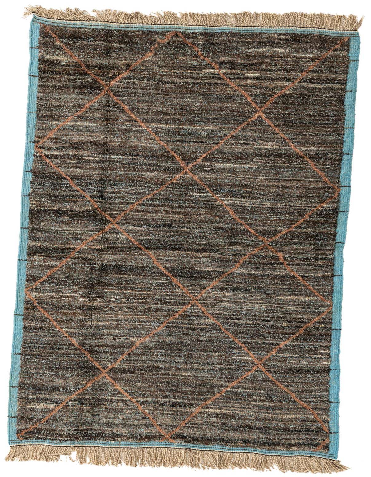A 5x8 rectangular Moroccan shag rug in shades of brown and tan with a subtle orange diamond pattern and blue border, perfect for a living room.