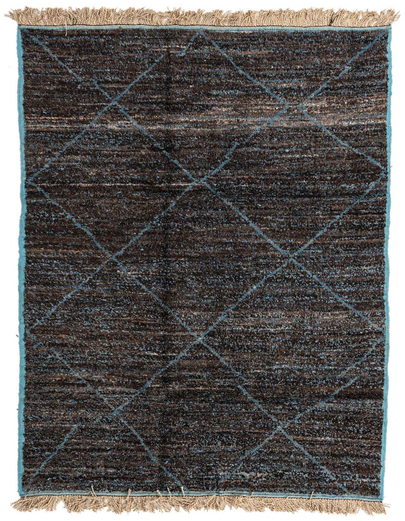 A 6x9 rectangular brown shag rug with a light blue diamond tribal pattern and fringed ends, suitable for a living room.