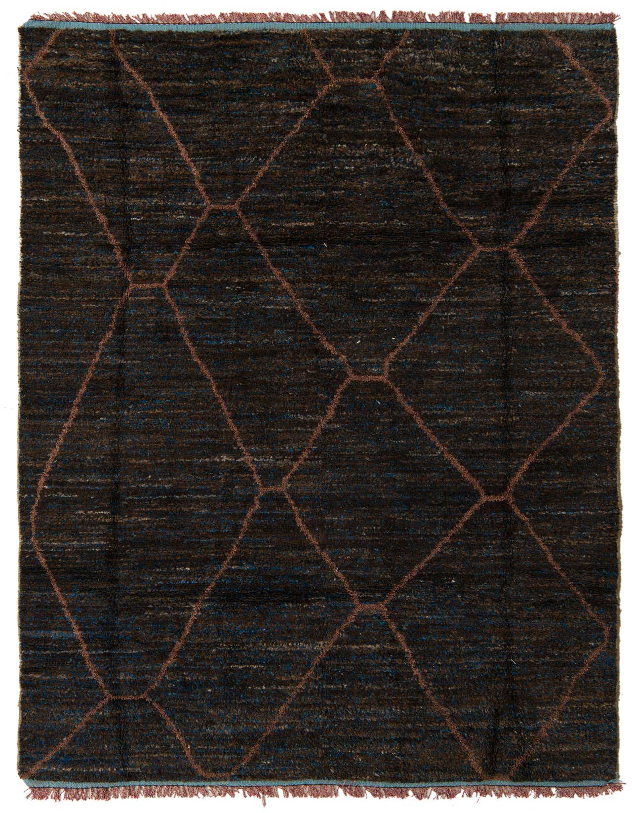 A 6x9 rectangular brown shag rug with a subtle tribal geometric pattern in lighter brown and hints of blue.