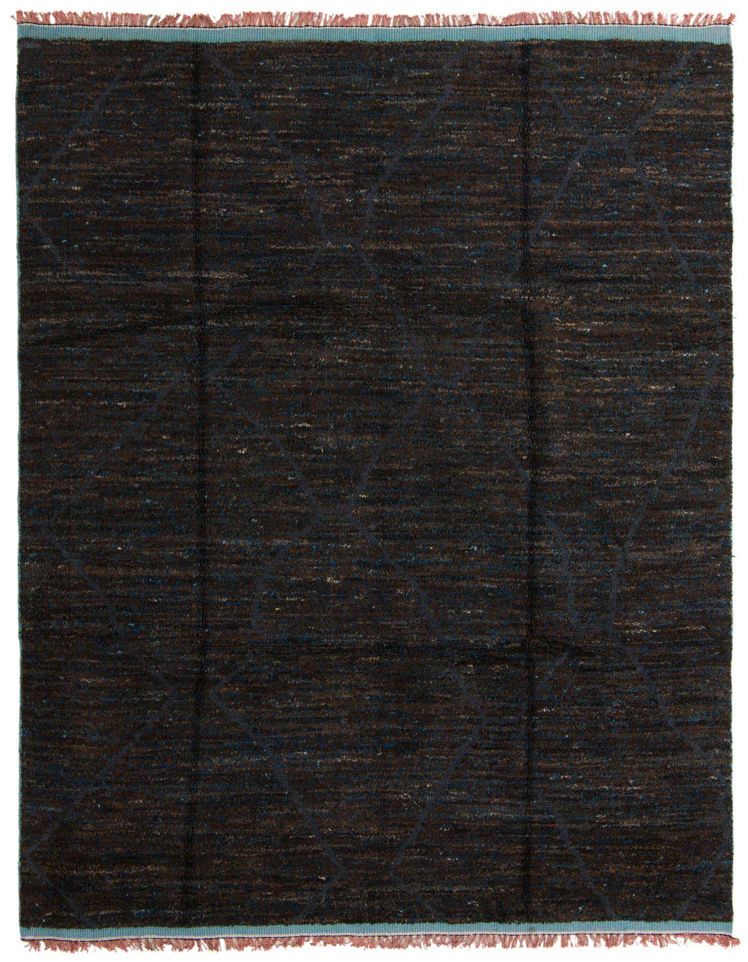 A rectangular 8x10 brown shag rug with subtle tribal patterns and light blue accents on the edges, suitable for a living room.