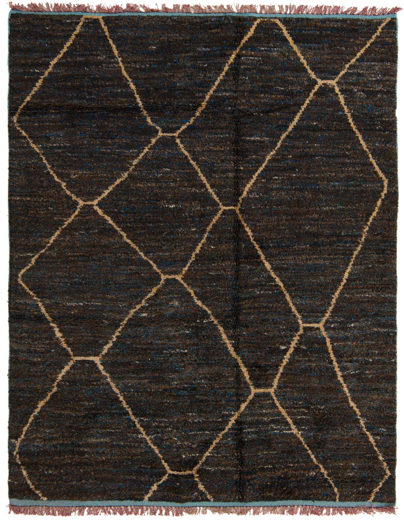 A 6x9 rectangular brown shag rug with a tan diamond tribal pattern and subtle blue accents, handmade for indoor use.