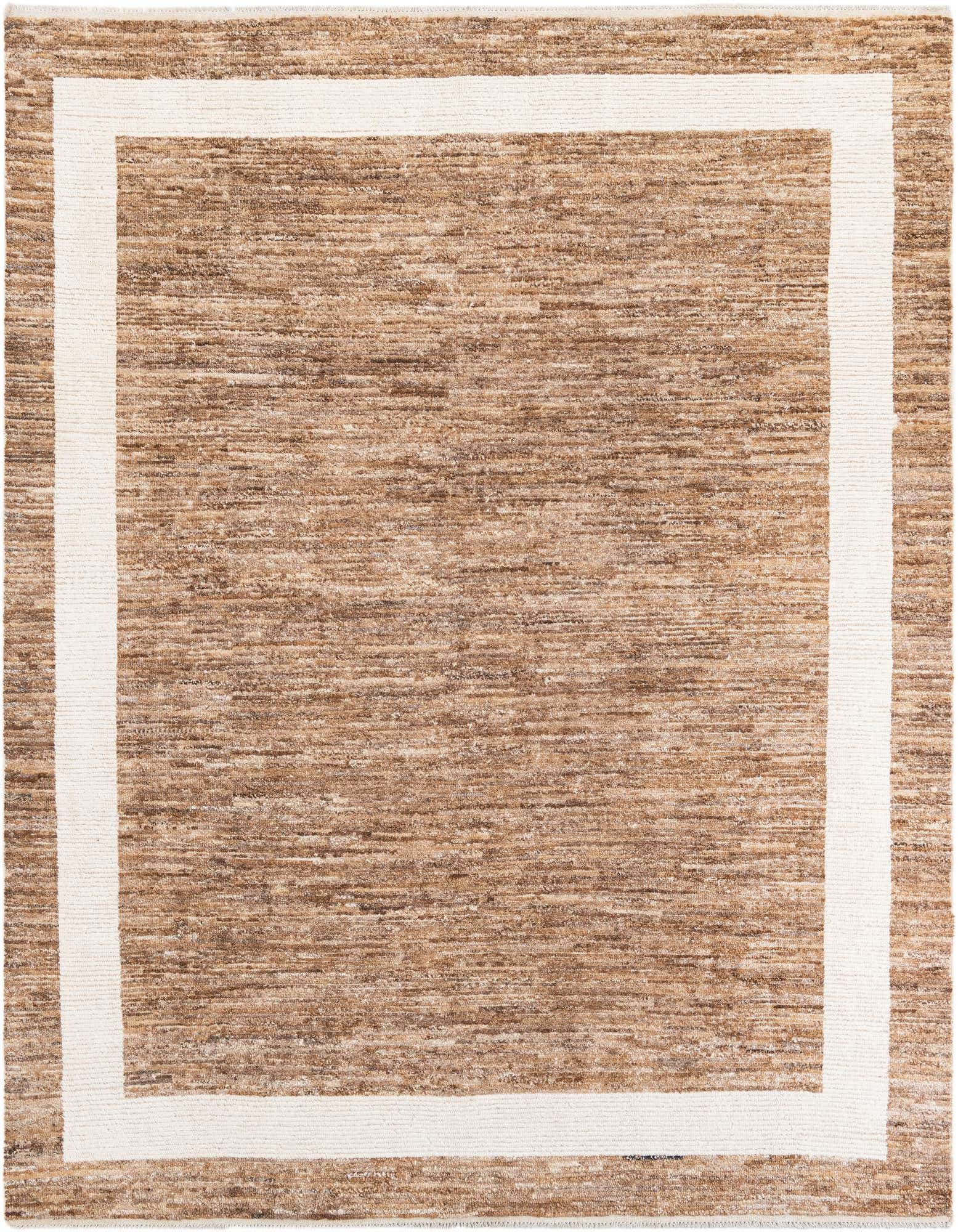 A rectangular 8x10 brown shag rug with a thick off-white border, perfect for a modern living room.