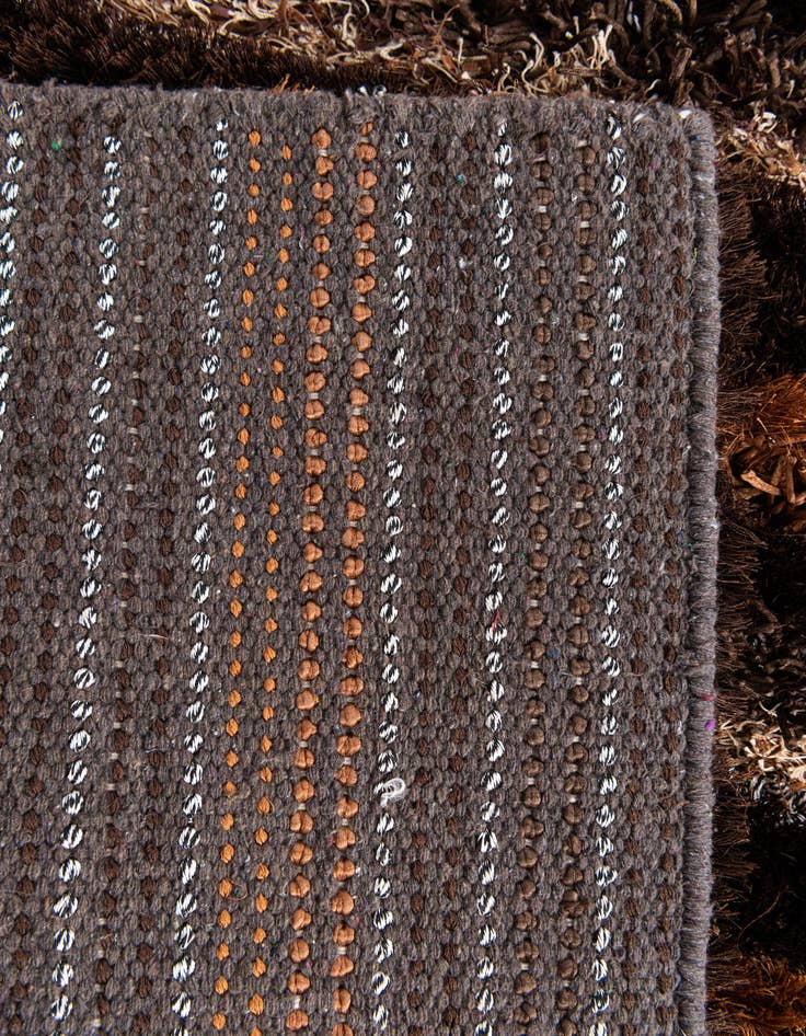 Detail image of  5' 1 x 6' 7  Hand Knotted Multi-Tone Shag Rug