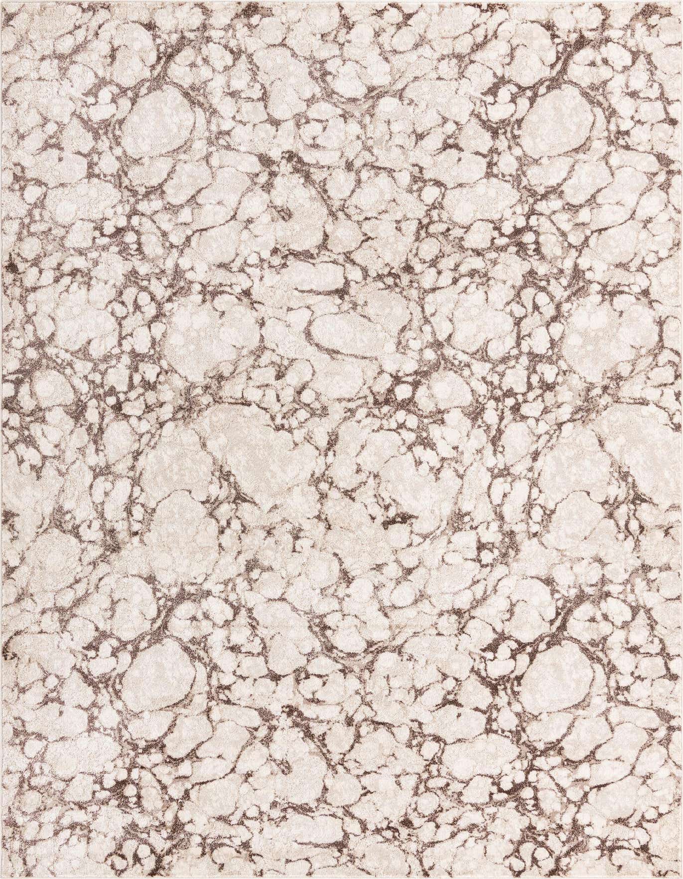 A 7x10 rectangular area rug featuring an abstract, coastal-inspired pattern in varying shades of brown and tan.