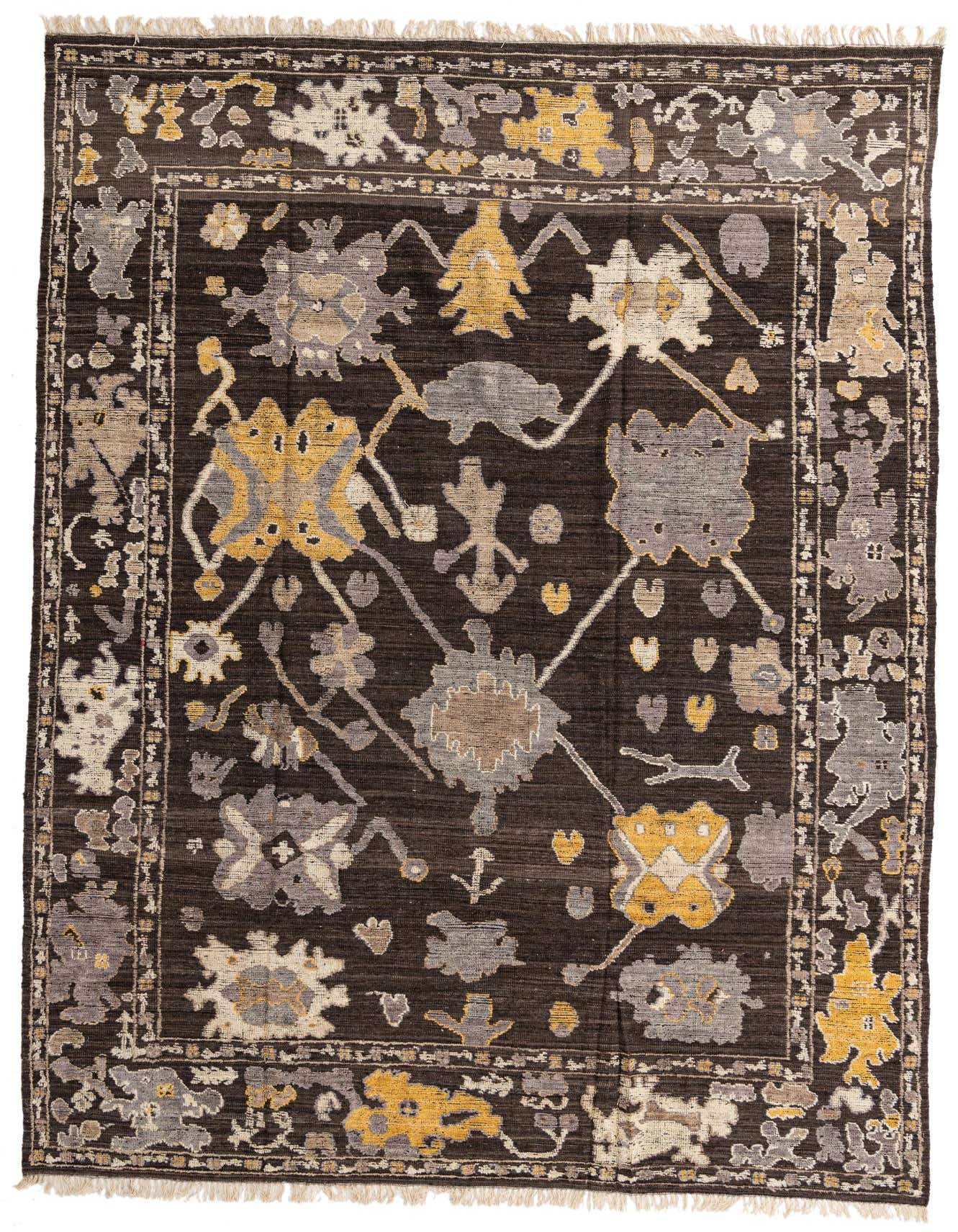 A 10x16 rectangular Oushak rug with a dark brown background and abstract patterns in tan, grey, and gold.