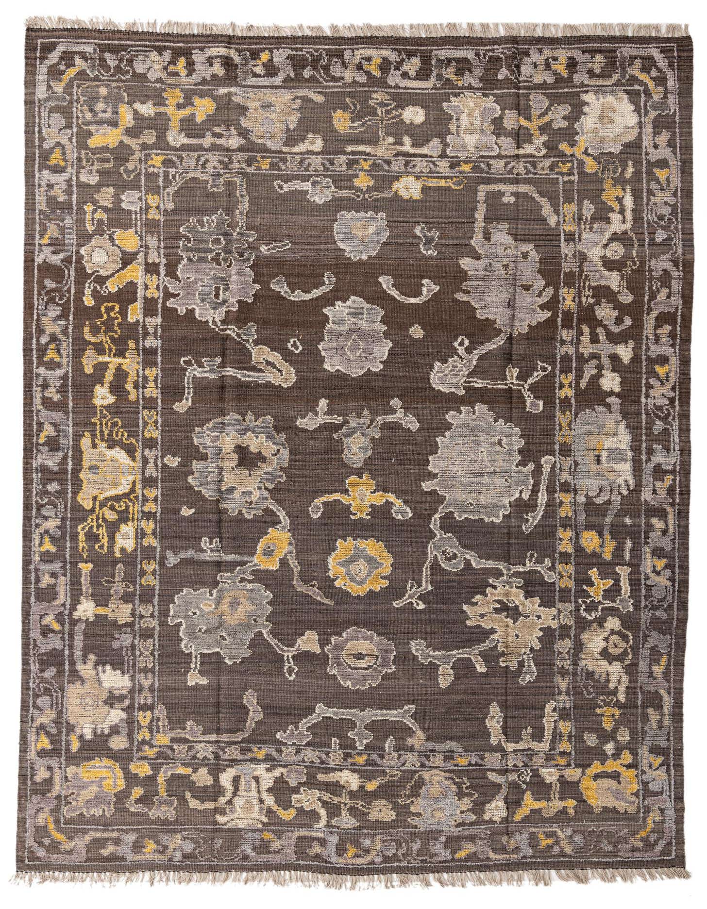 A 9x12 rectangular Oushak rug in shades of brown and tan, featuring a modern floral and vine pattern with a decorative border.