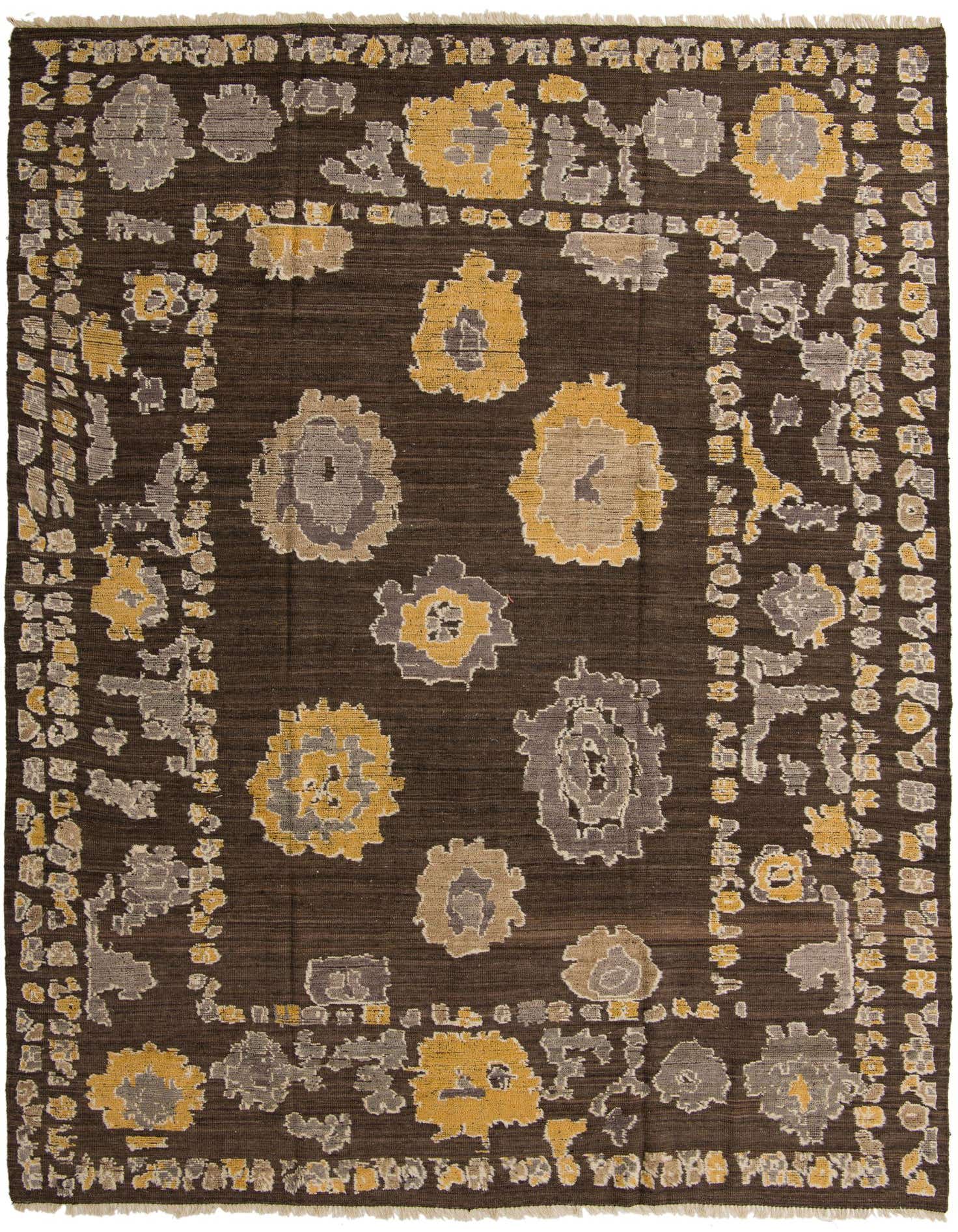 A 10x14 rectangular brown wool rug with an abstract pattern of gold and gray floral-like shapes and a decorative border.