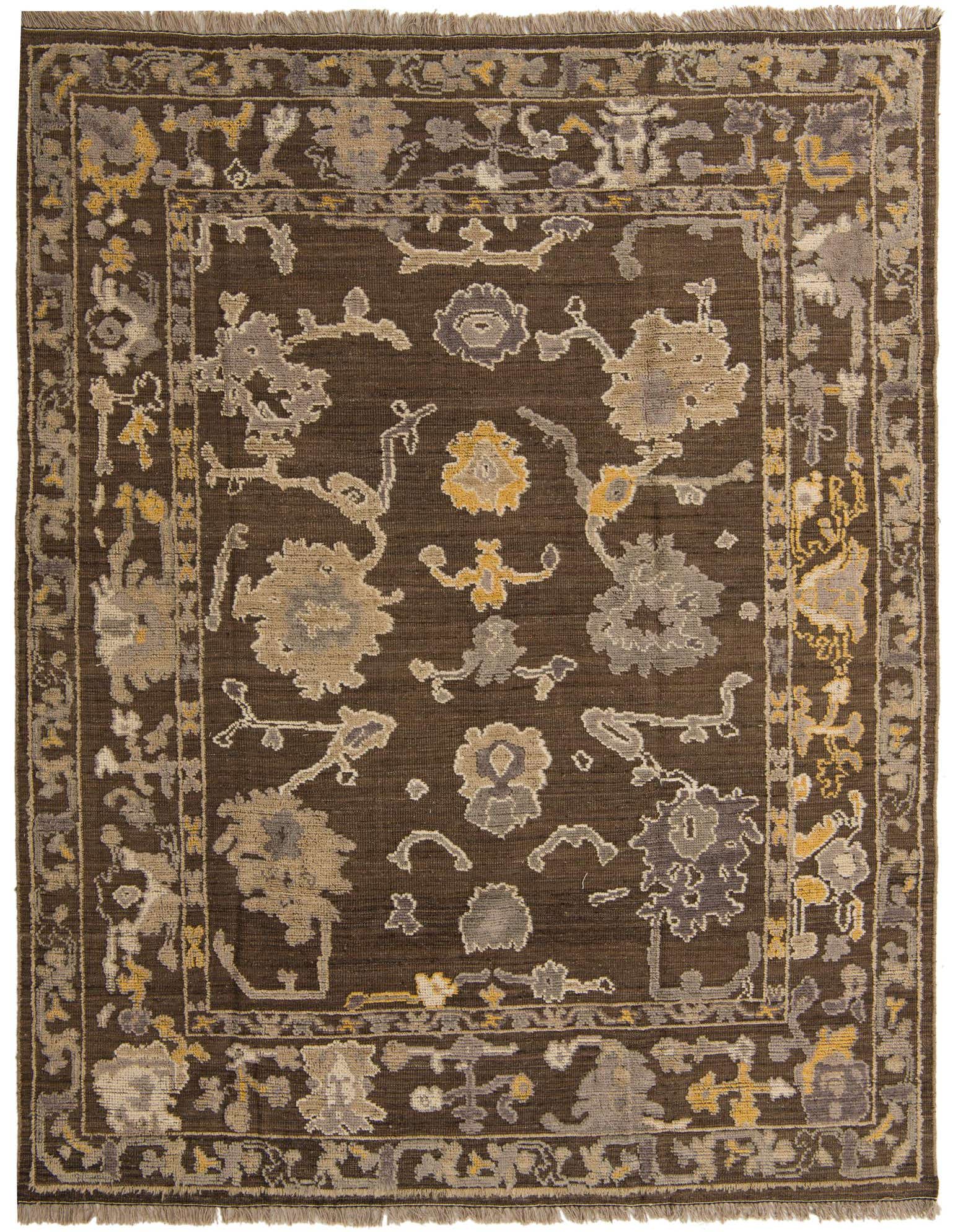An 8x10 rectangular Oushak rug in browns and tans with a modern abstract pattern and fringed edges.