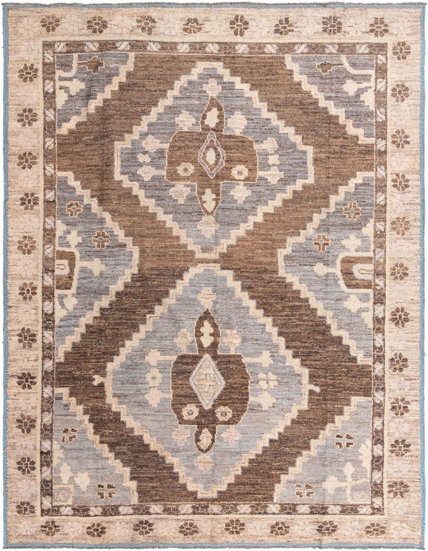 A 10x14 rectangular Oushak wool rug featuring a modern medallion pattern in shades of brown, tan, and light blue.