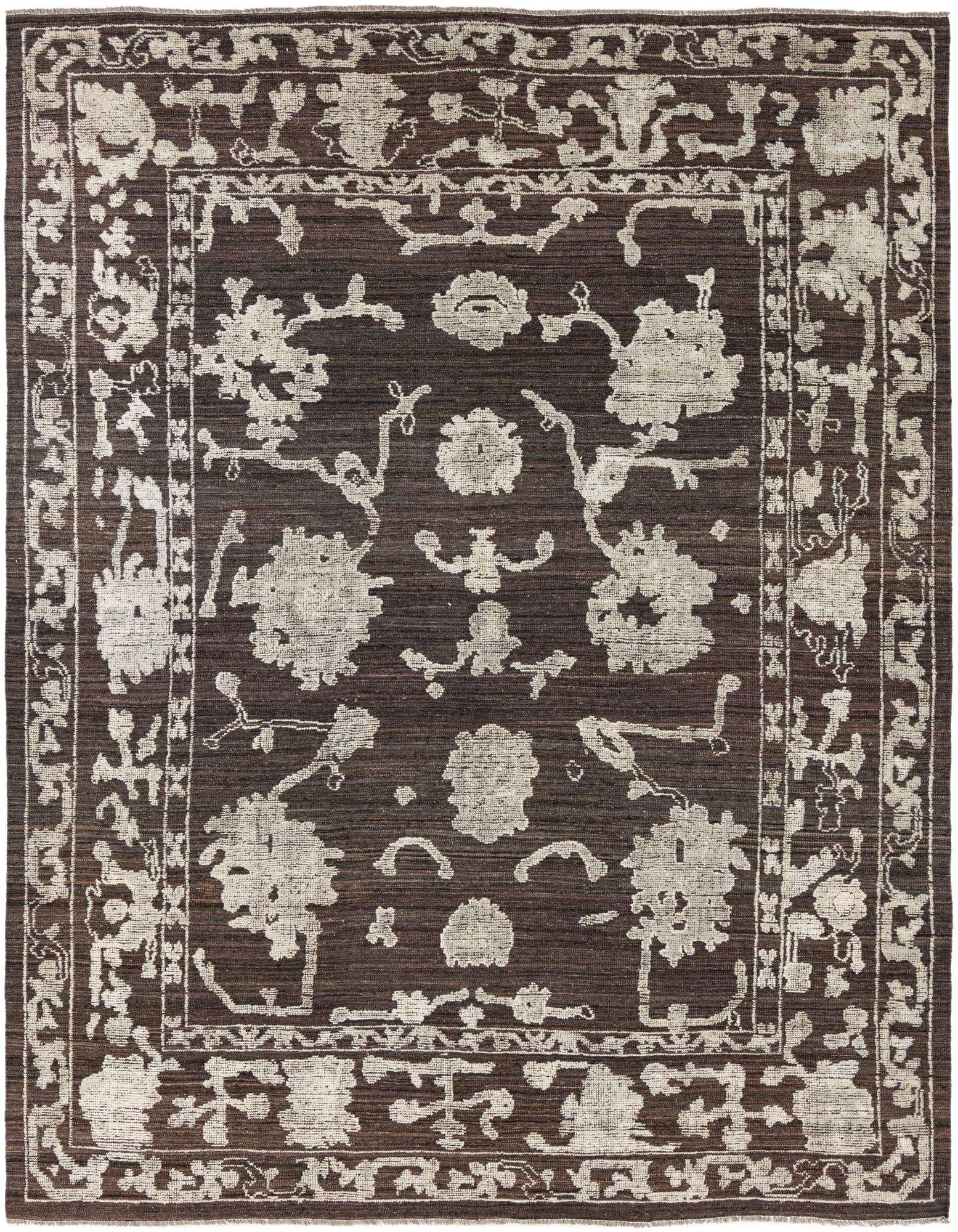 A 9x12 rectangular Oushak rug in brown with a modern tan floral pattern and border, suitable for a living room.