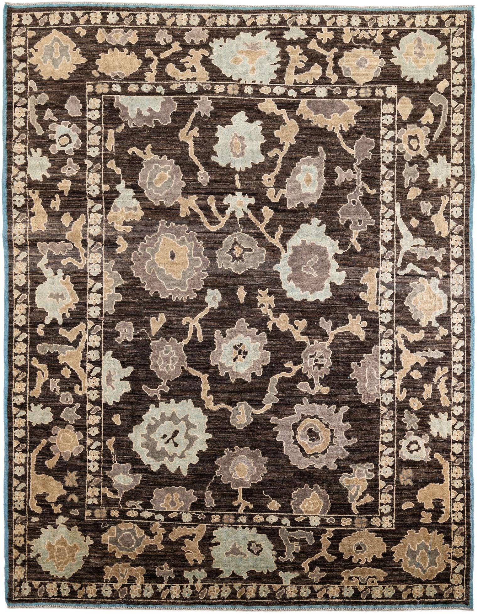 A 9x12 rectangular brown Oushak rug with a modern floral pattern in tan, light blue, and gray, featuring a detailed border.