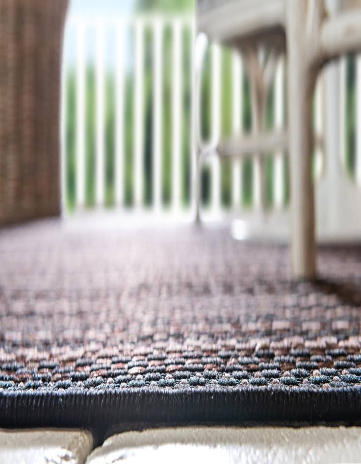 Detail image of  7' x 10'  Washable Border Indoor / Outdoor Rug