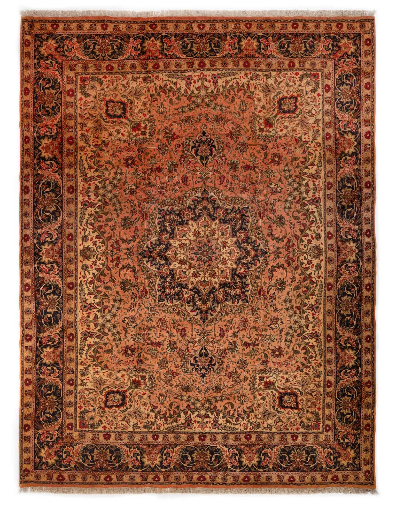 A 10x13 rectangular Persian Tabriz rug featuring a central medallion and intricate floral patterns in shades of brown, tan, and deep red.