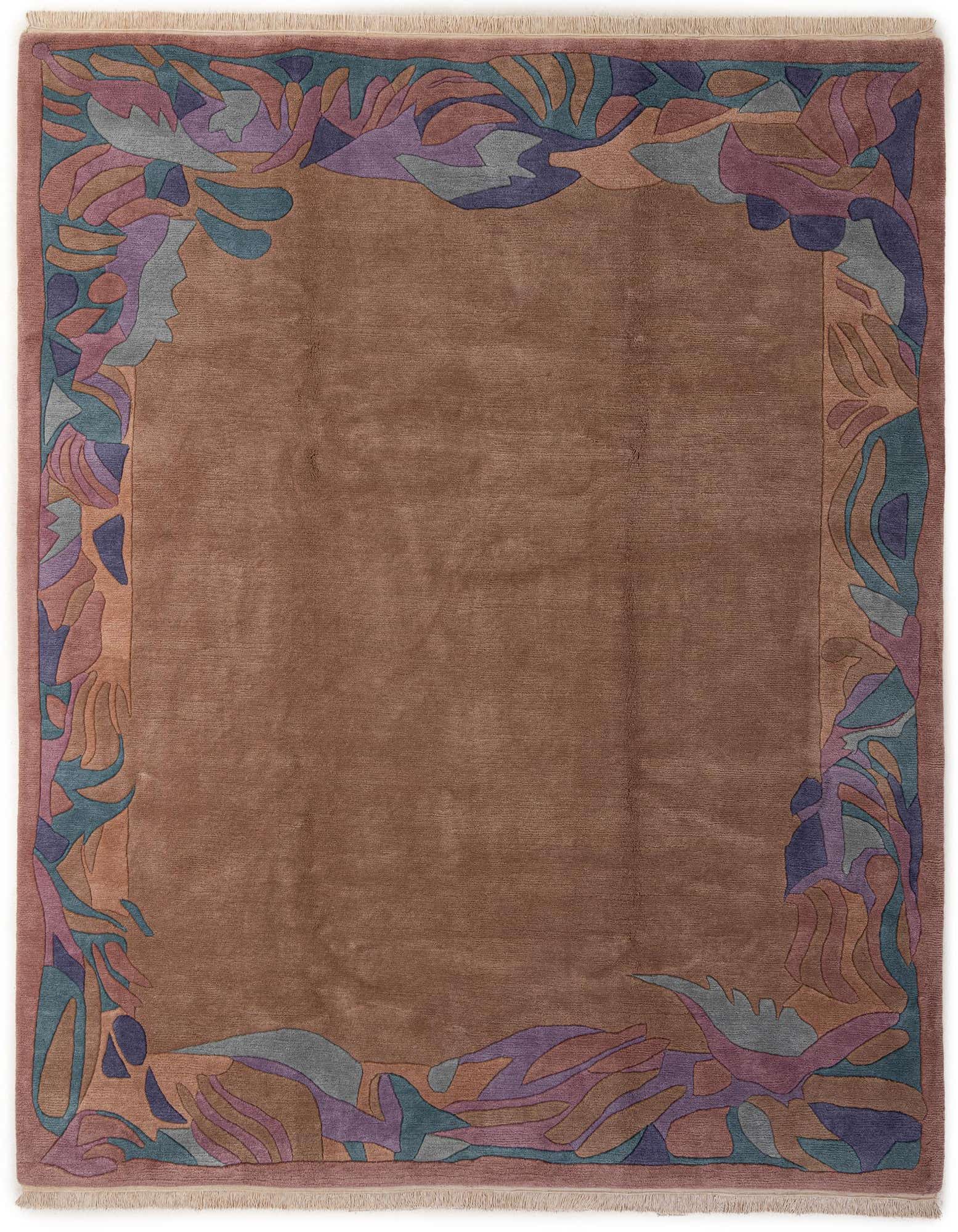 An 8x10 rectangular brown wool rug with a modern abstract border in shades of purple, teal, and tan.