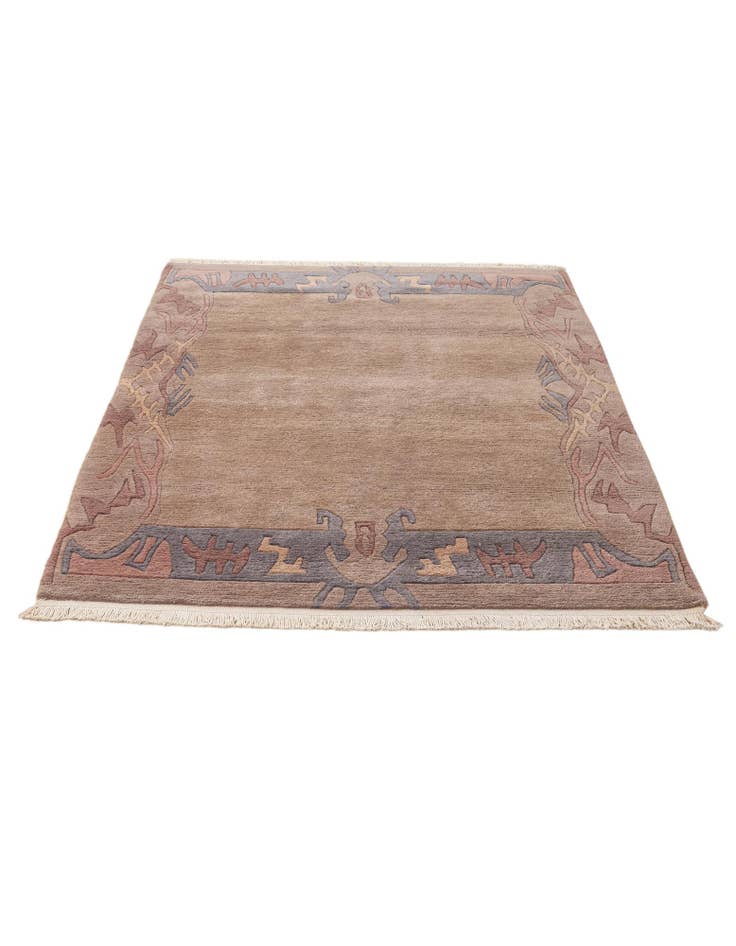 Detail image of  4' 1 x 5' 10  Hand Knotted Tibet Wool Rug