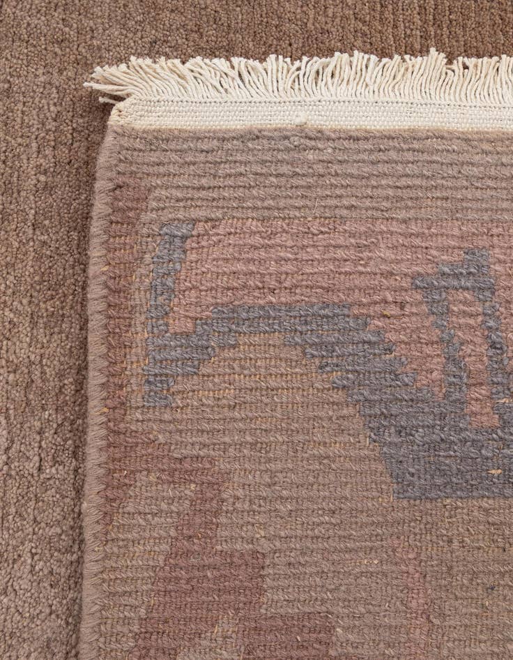 Detail image of  4' 1 x 5' 10  Hand Knotted Tibet Wool Rug