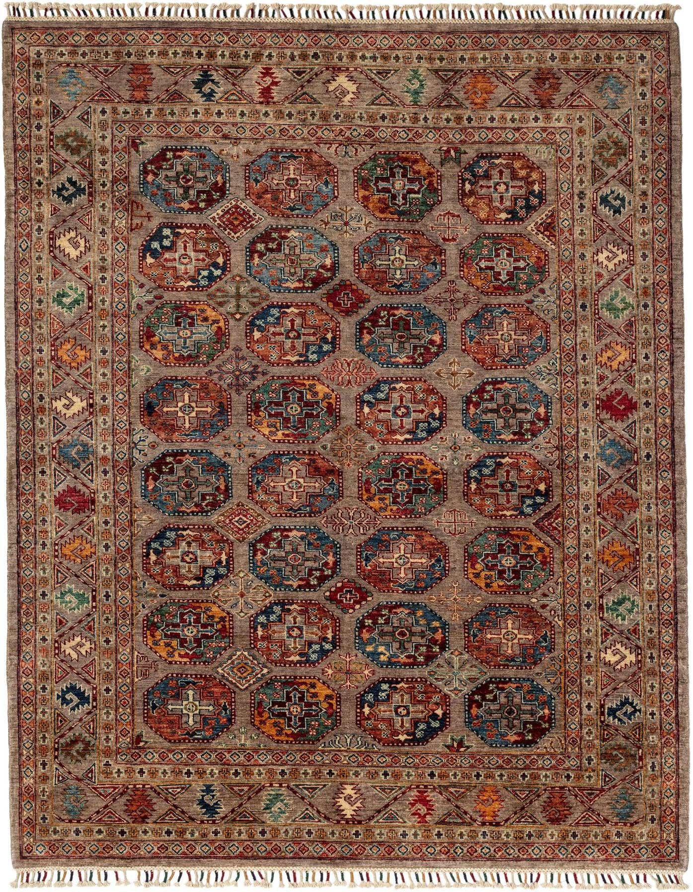 A 5x8 rectangular Rugs.com Torkman Persian rug with a brown and tan background, featuring colorful octagonal medallions and intricate borders.