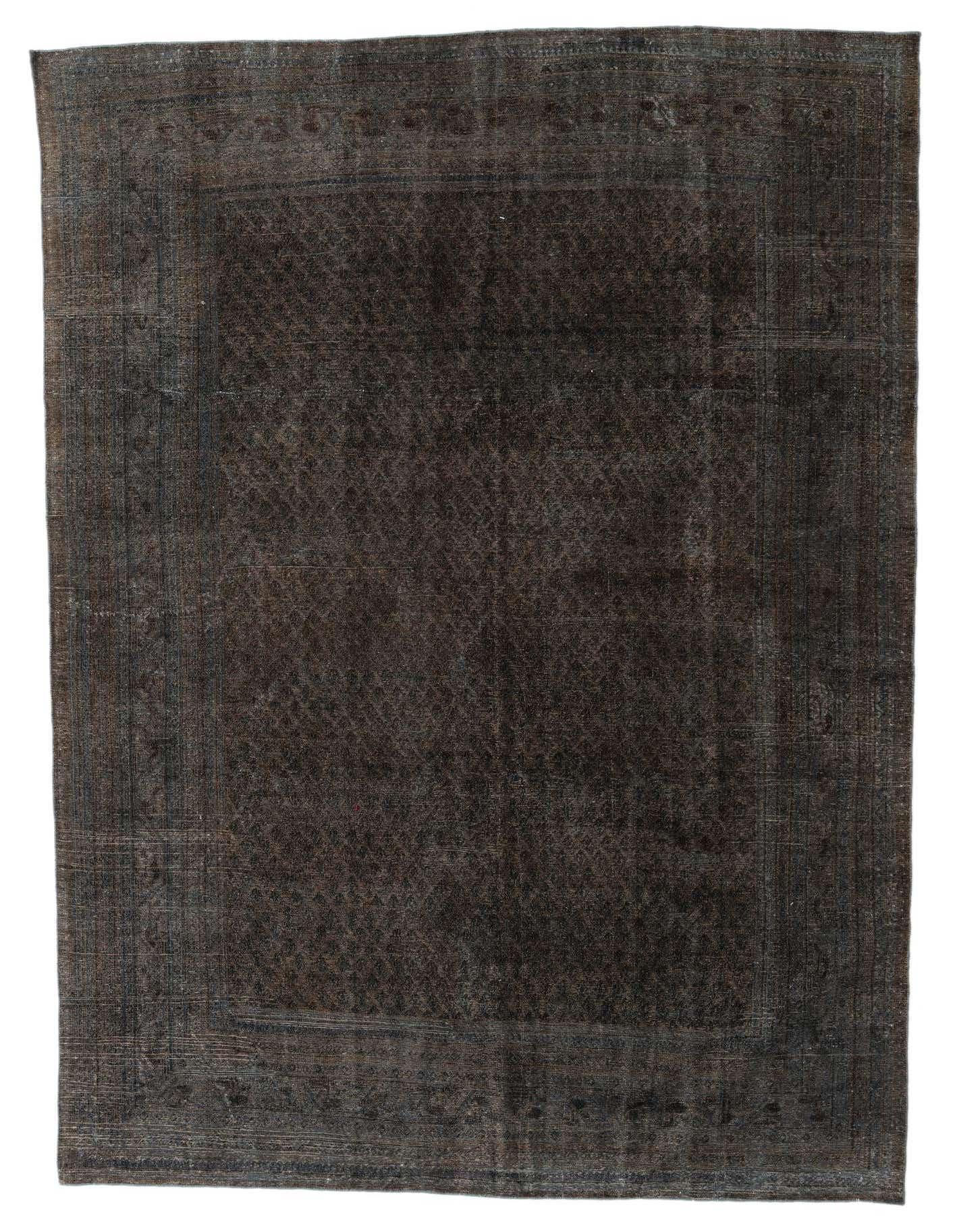 A 7x10 rectangular Ultra Vintage wool rug in shades of brown and tan, featuring a distressed Persian pattern with a subtle border, ideal for a living room.