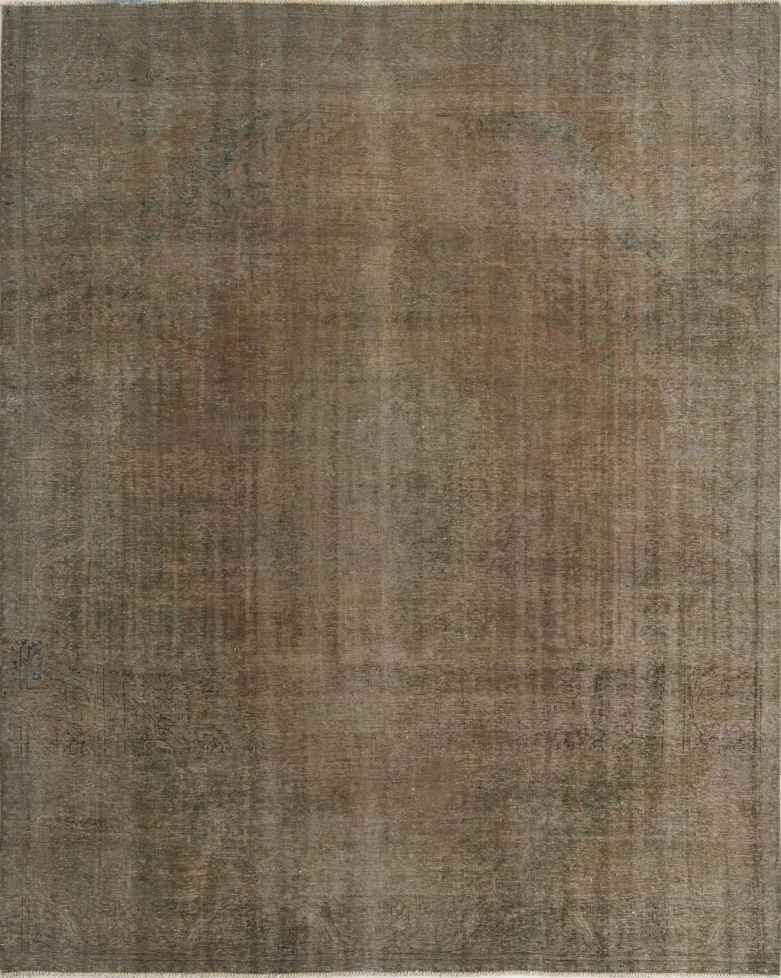 A 10x12 rectangular brown and tan wool rug with a subtle, faded Persian pattern, ideal for a living room.