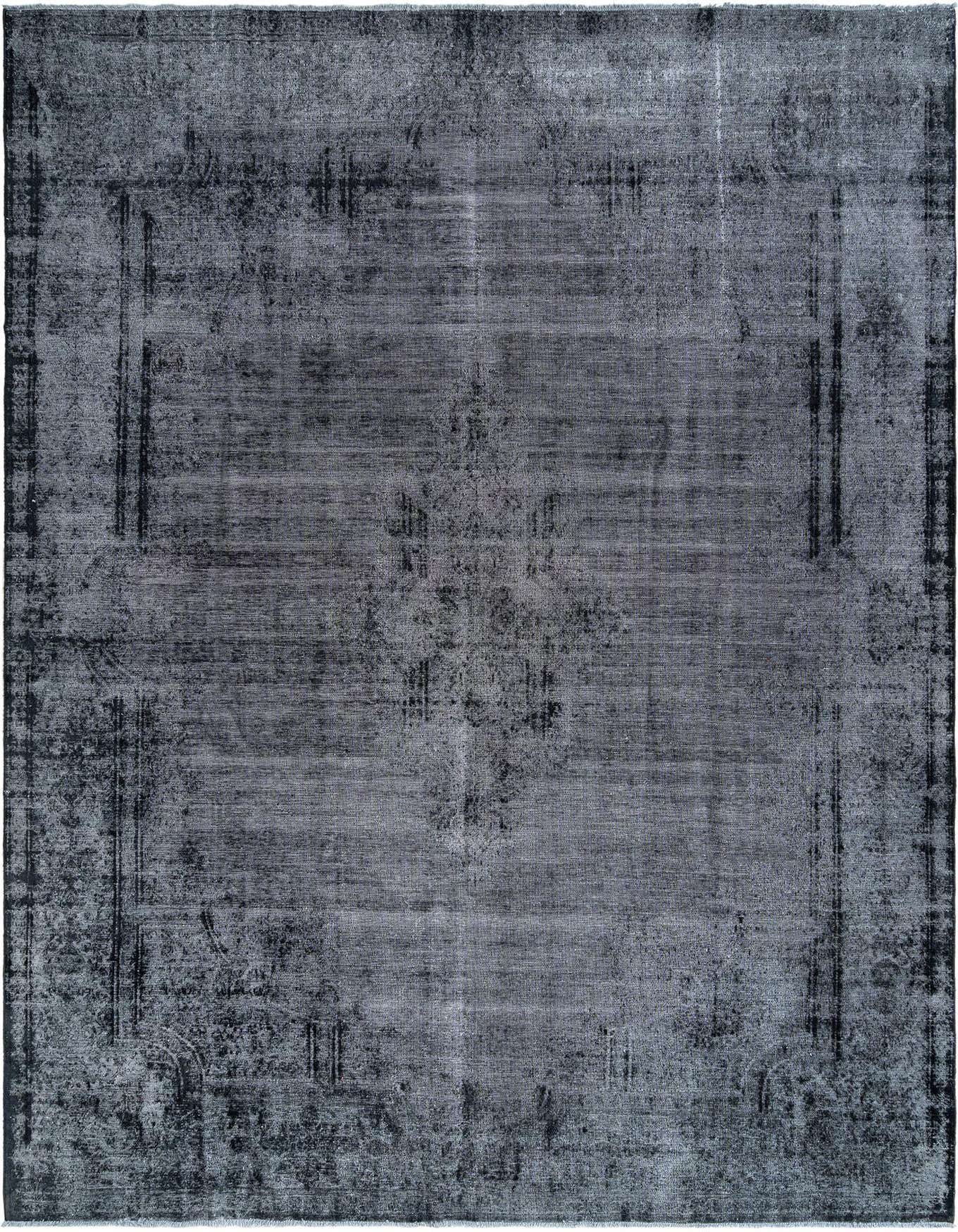 A 10x14 rectangular Rugs.com Vintage Royal area rug in shades of brown and tan, featuring a distressed Persian pattern, suitable for indoor use.