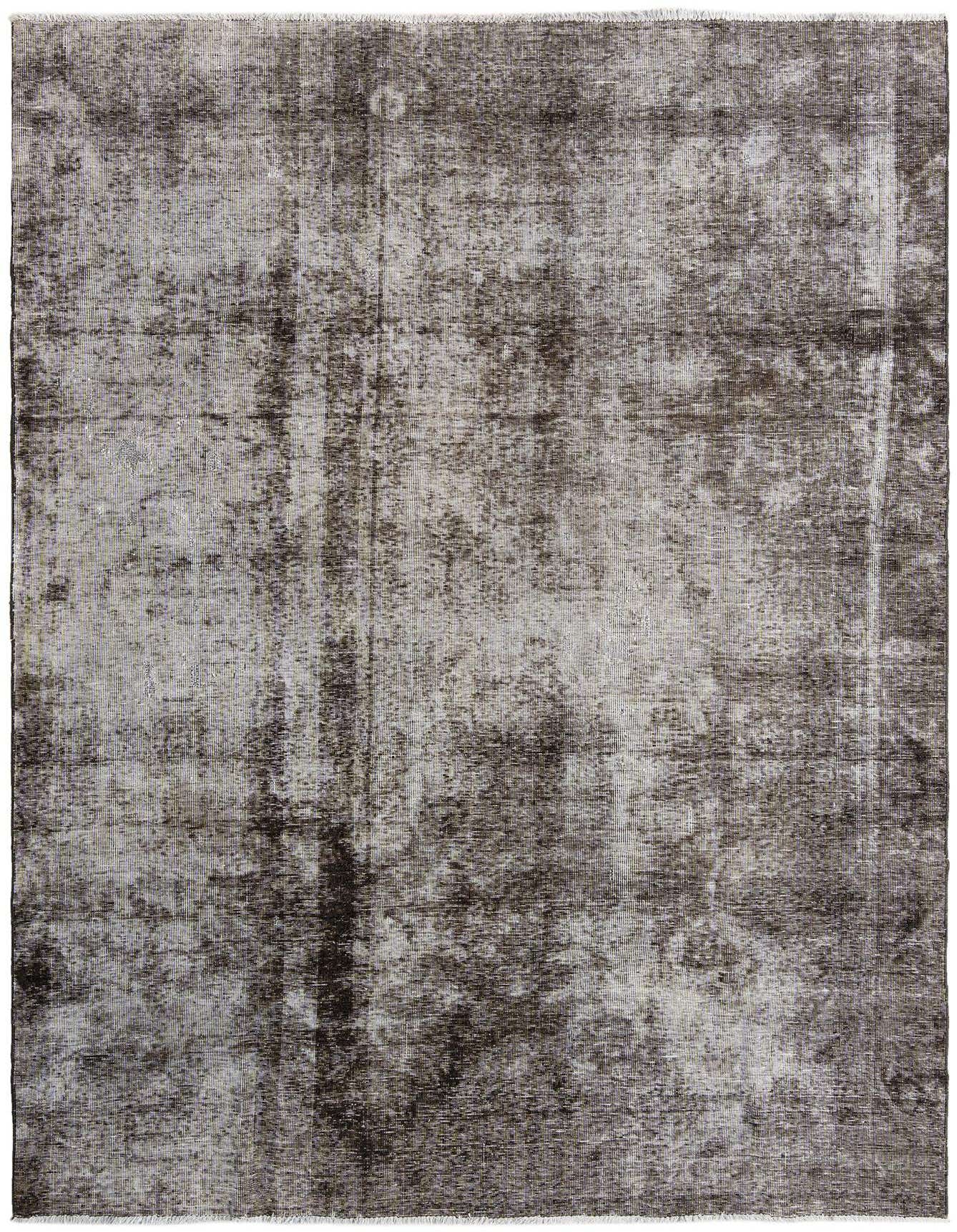 A 7x10 rectangular brown and tan Persian wool rug with a distressed vintage pattern, suitable for a living room.