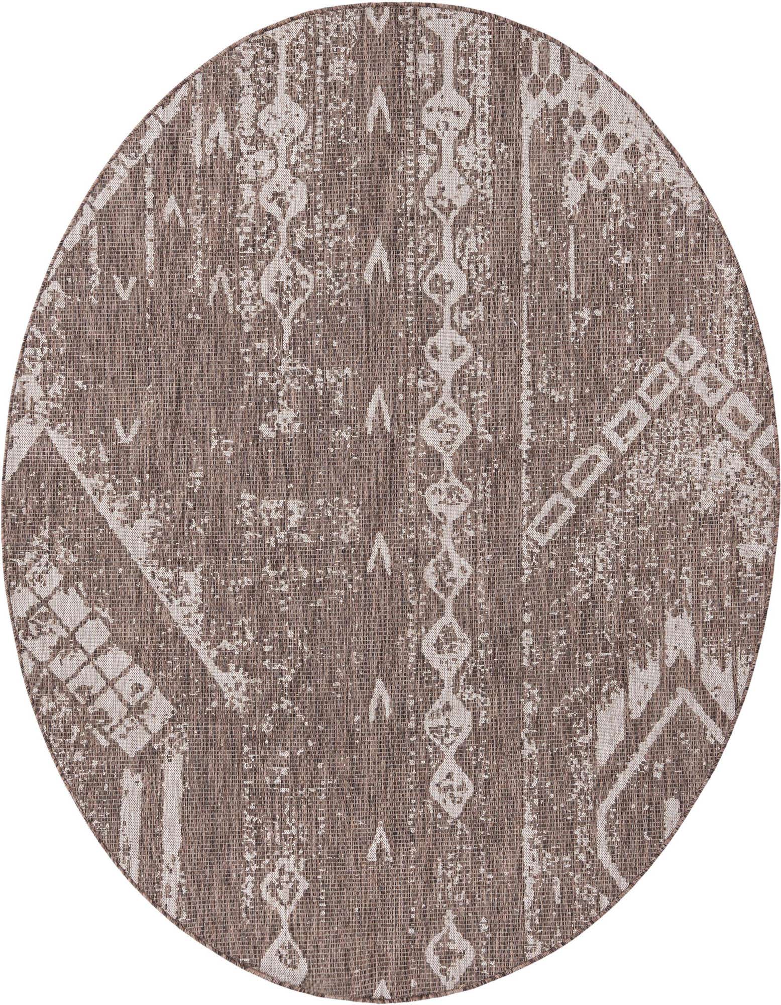 A round brown and tan modern outdoor rug with a distressed geometric pattern, suitable for a patio.