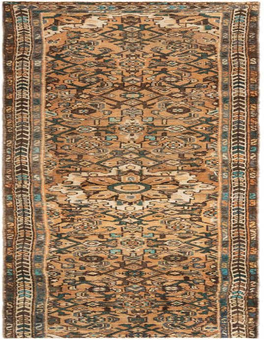 A handmade 8 ft runner rug with a tribal, traditional pattern in shades of brown, tan, and teal, suitable for a hallway or kitchen.