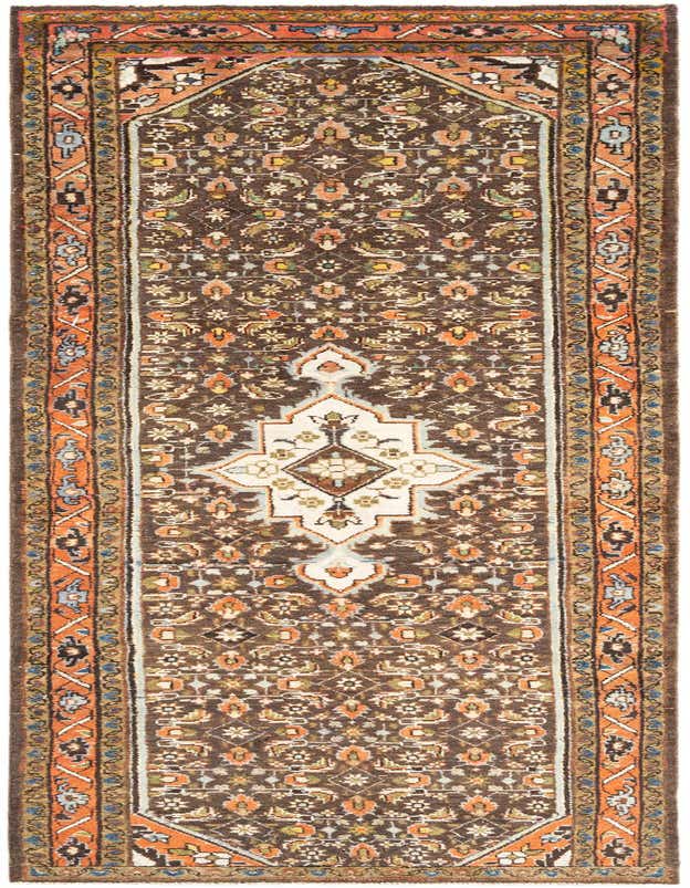 A 10 ft Hamedan runner rug in browns and tans, featuring a traditional tribal pattern with a central medallion and intricate floral motifs, ideal for hallways.
