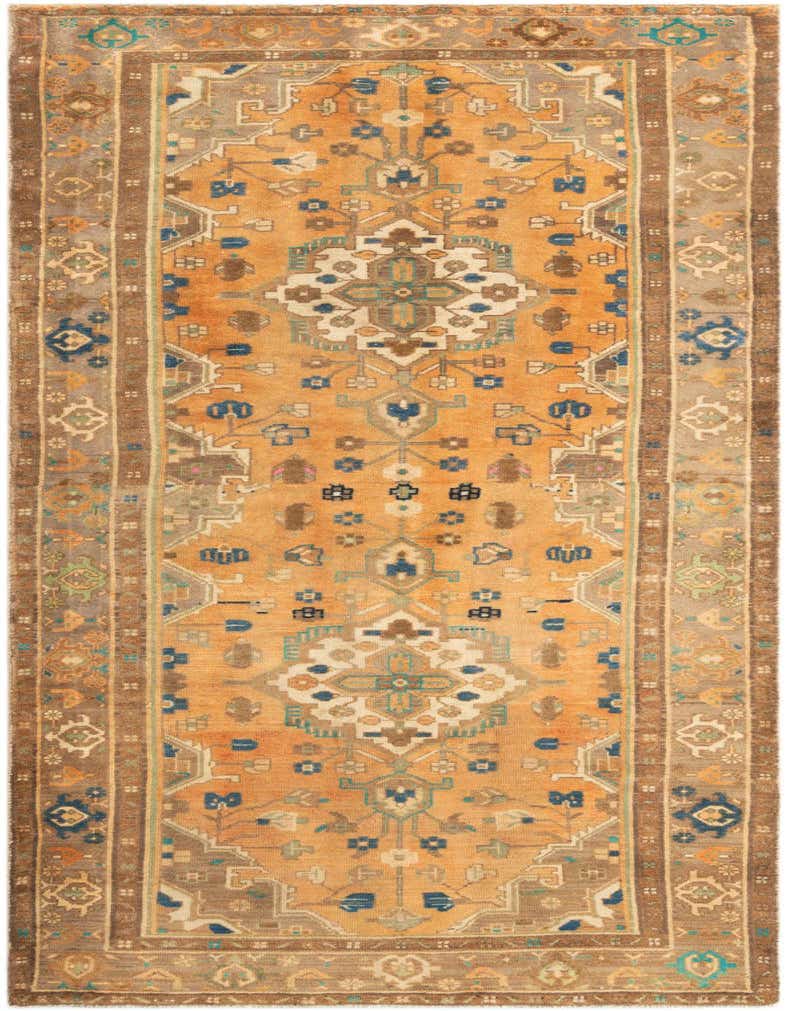 A 10 ft Hamedan runner rug in warm browns and tans, featuring traditional tribal patterns with blue and teal accents, perfect for a hallway.