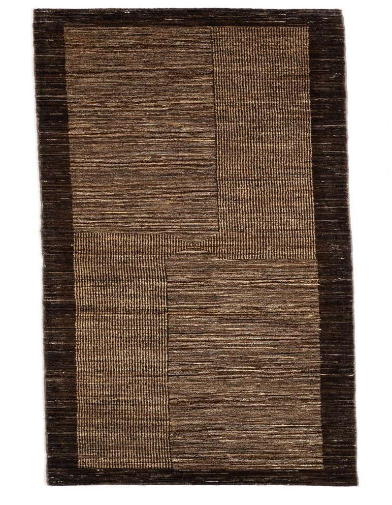 A Juma 8 ft runner rug in shades of brown and tan, featuring a Persian geometric pattern with varied textures, ideal for a hallway or kitchen.