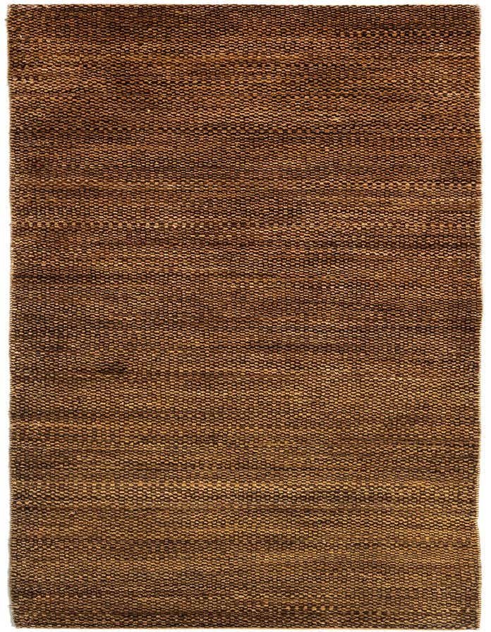 A close-up view of an 8 ft runner rug from the Juma collection, featuring a textured Persian pattern in varying shades of brown and tan.