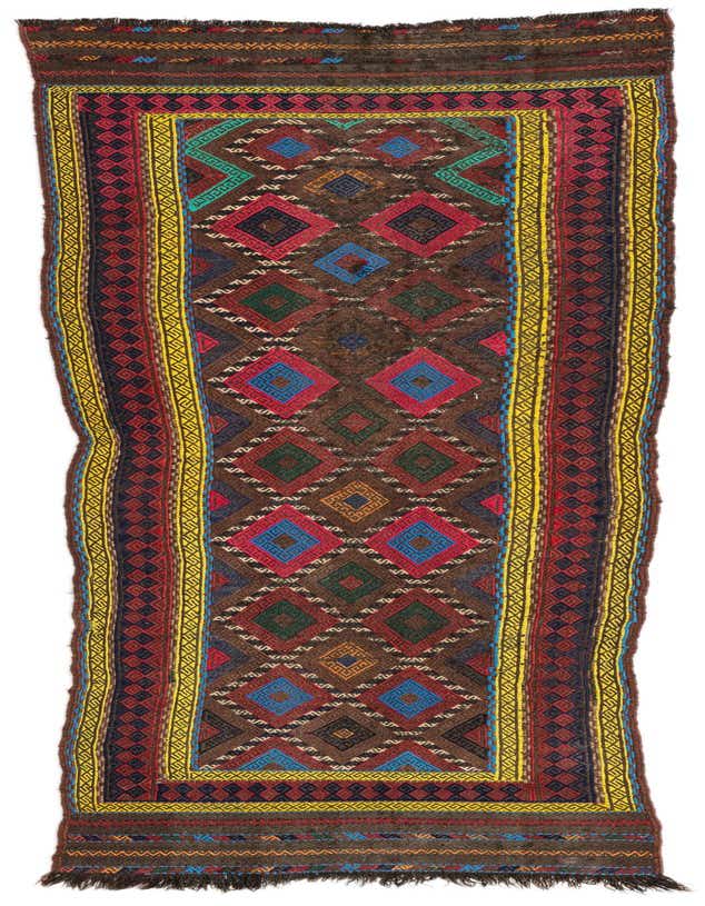 A long, narrow Kilim Fars 8 Ft Runner rug with a brown background and vibrant tribal geometric patterns in red, blue, green, and yellow.