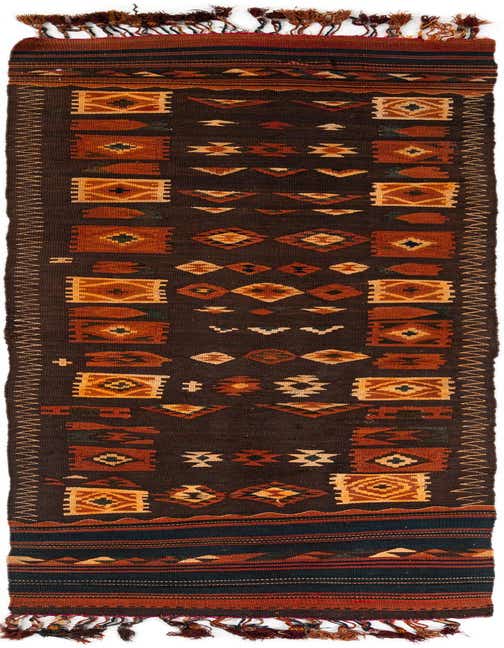A 12 ft runner rug in Kilim Fars collection, featuring tribal patterns in browns and tans.