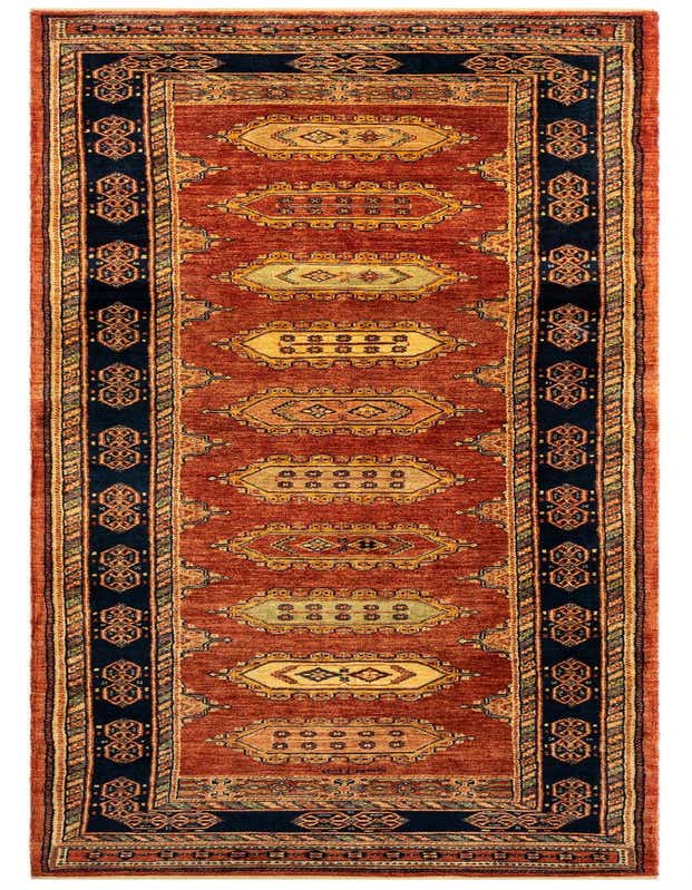 A 10 Ft Luribaft runner rug in rich browns and tans with intricate Persian patterns, ideal for a hallway.