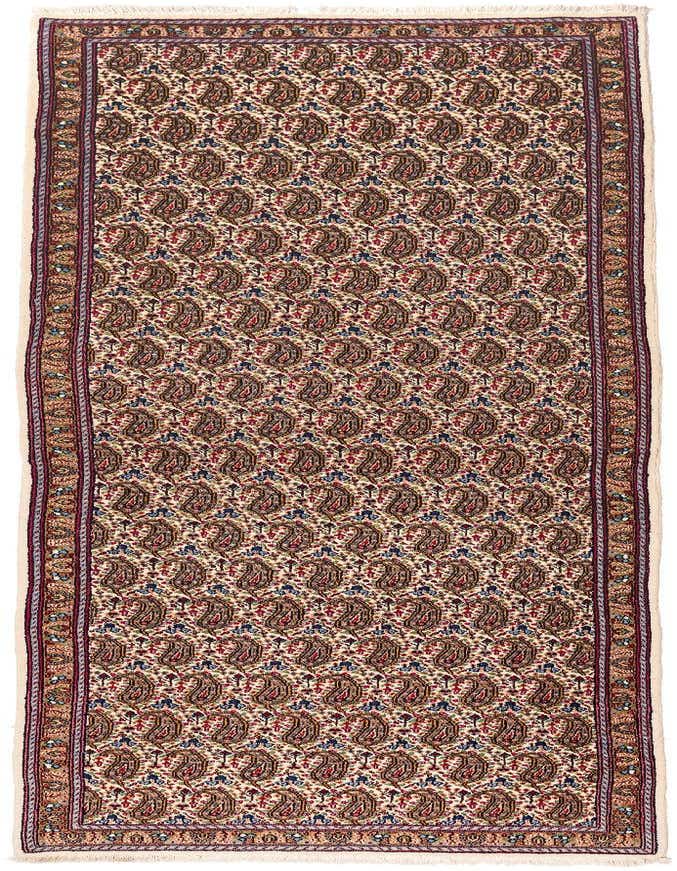 A 10 ft Moud runner rug in browns and tans with a detailed traditional paisley pattern and fringed ends, ideal for a hallway.