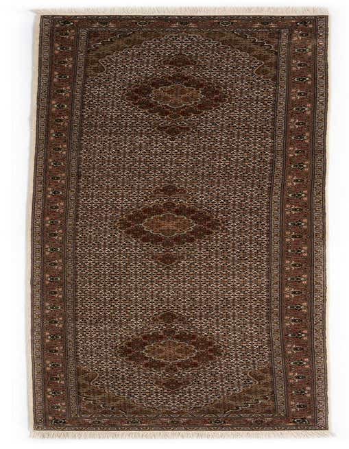 A 12 ft runner rug from the Tabriz Mahi collection, featuring an intricate Persian pattern in shades of brown and tan, with fringe.
