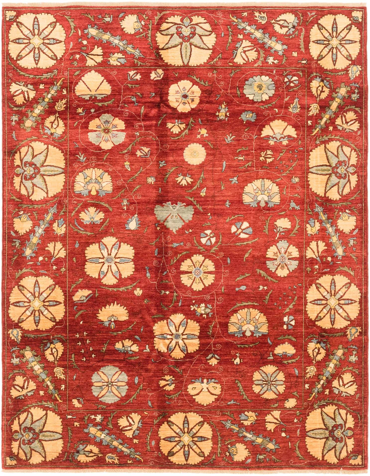 A 6x9 rectangular Ariana Ziegler rug featuring a rich red field with large, intricate floral and medallion patterns in cream, blue, and green.