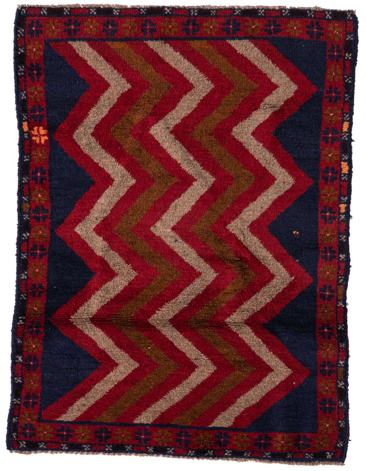 A 3x5 rectangular Balouch rug featuring a bold red, brown, and beige chevron pattern on a deep blue background, with a traditional border.