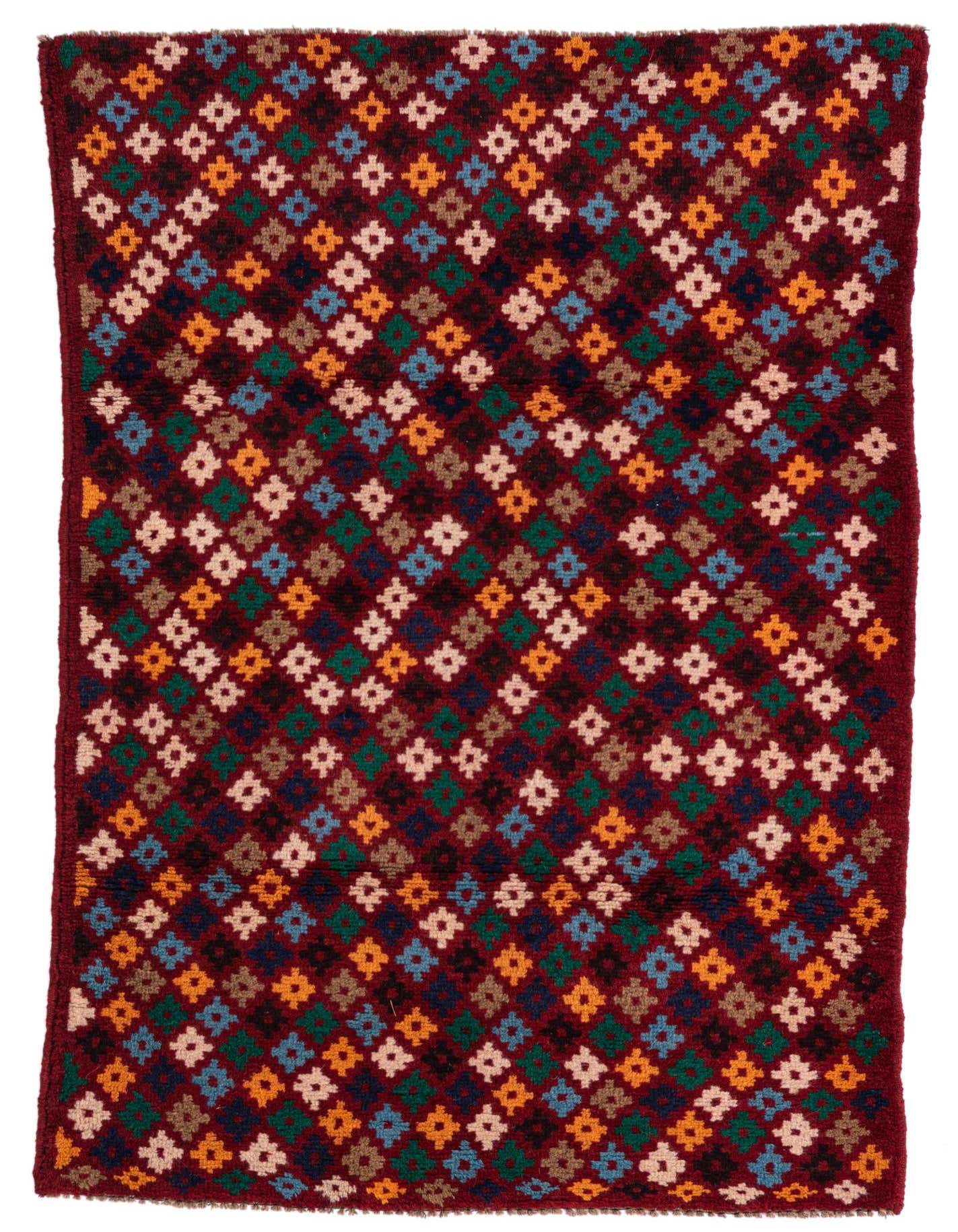 A 3x4 rectangular Balouch wool rug featuring a traditional tribal pattern of colorful diamonds on a deep red background.