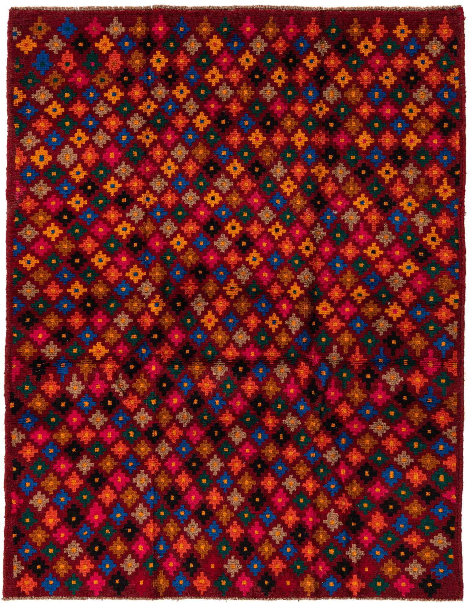 A 4x6 rectangular Balouch tribal rug with a deep red background and a vibrant, repeating abstract pattern of small, colorful geometric shapes in blue, orange, yellow, pink, and black.